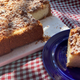 Rice Pudding Cheesecake Pie on gingham tablecloth